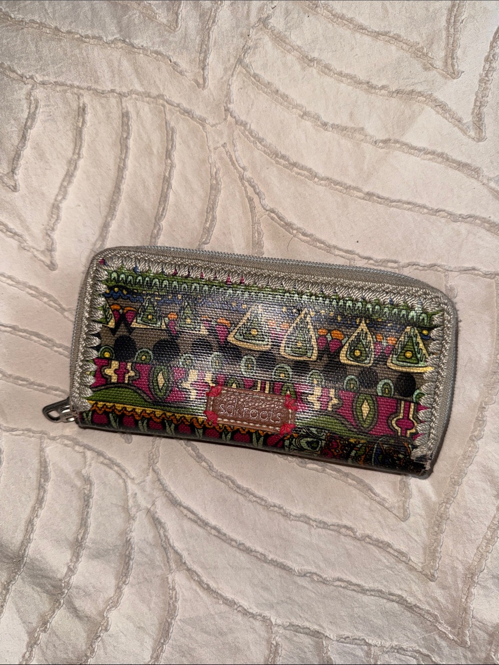 Sakroots Metallic Silver Zip Wallet with Multicolor Tribal Pattern